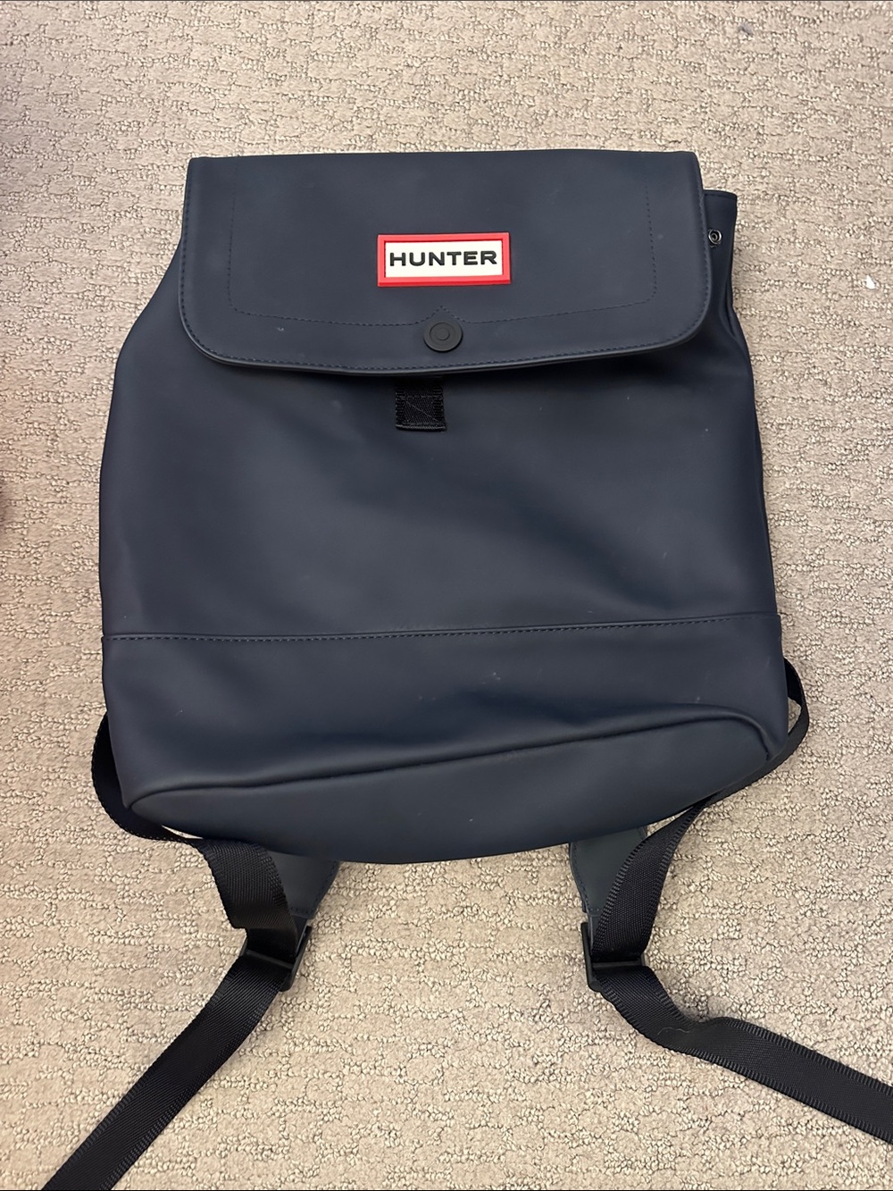 Hunter Navy Blue Waterproof Backpack with Red Logo Accent